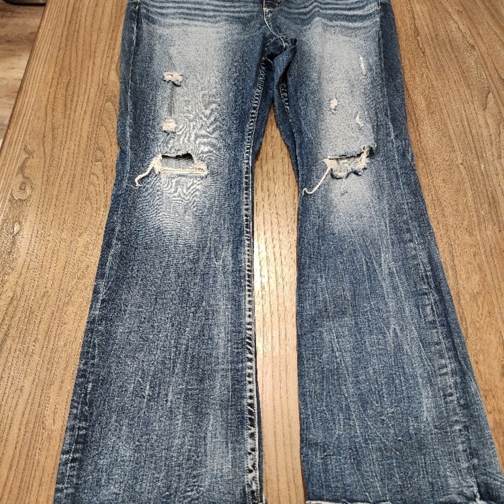 Distressed Blue Jeans